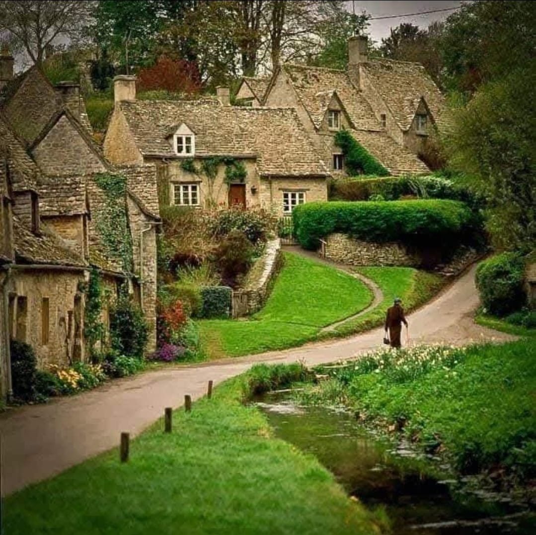 Walker by Arlington Row and the River Coln